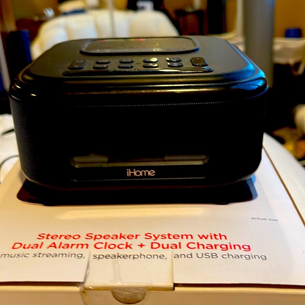 iHome stereo speaker system with Dual Alarm Clock+Dual Charging.